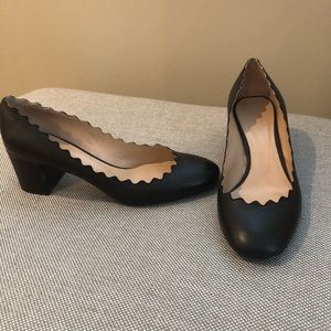 Black scalloped heels by luxury designer Chloe